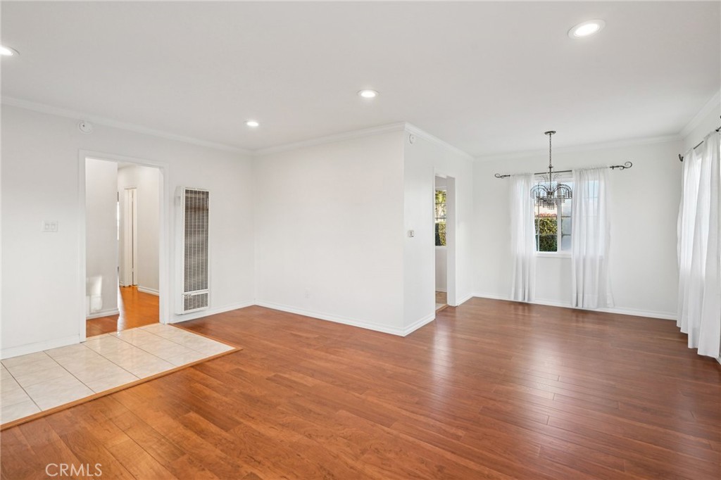 732 East Charron Place Compton, CA 90220 - Photo 7 of 24 a view of a room with wooden floor and window