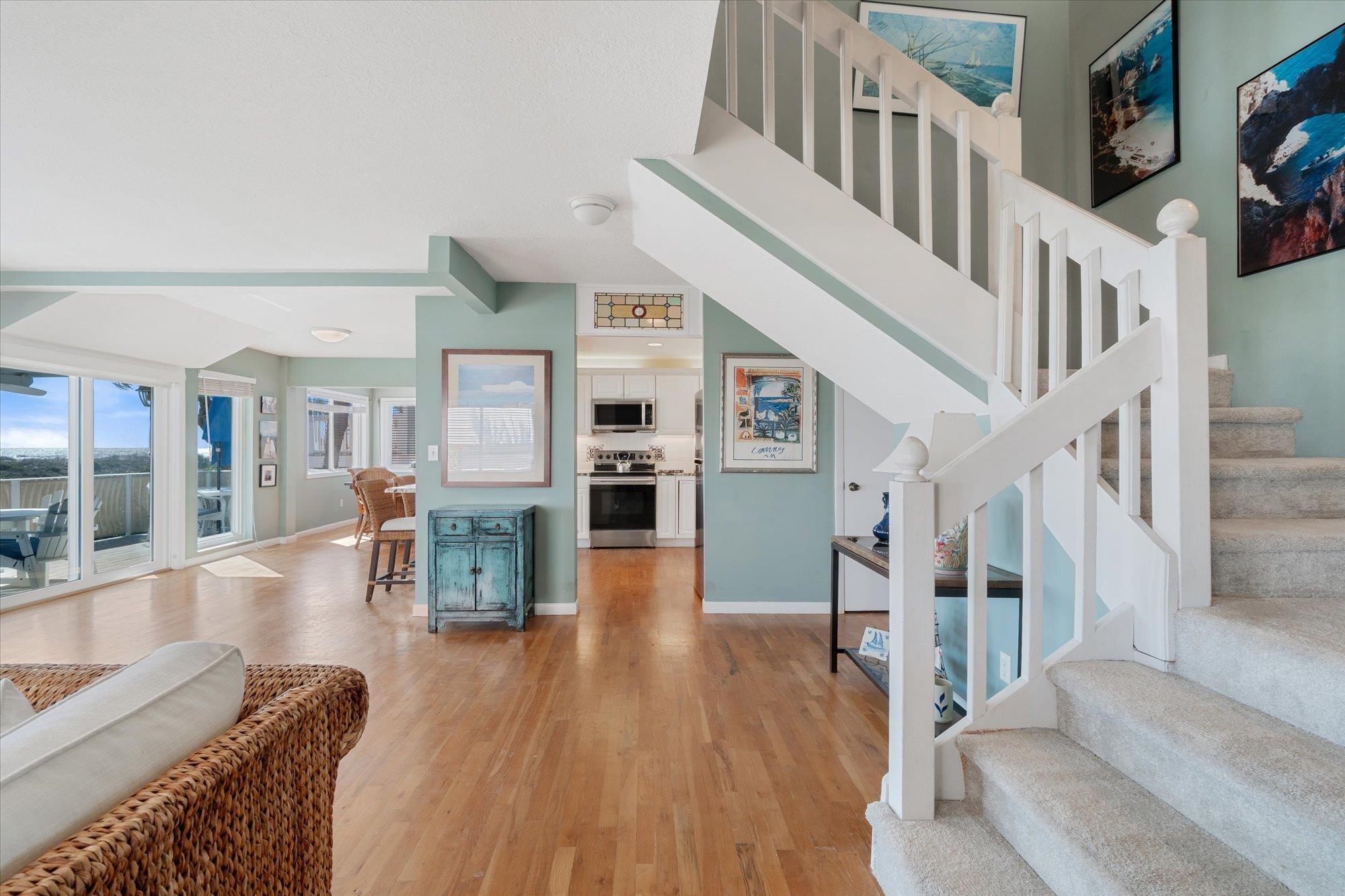 5512 Atlantic View St. Augustine, FL 32080 - Photo 19 of 77 Stairway with wood finished floors and baseboards