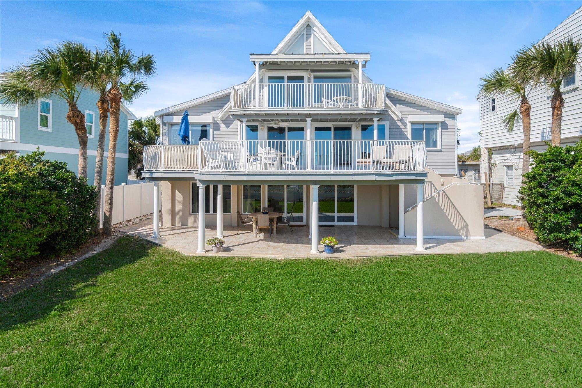 5512 Atlantic View St. Augustine, FL 32080 - Photo 2 of 77 Rear view of property with a patio area and a balcony