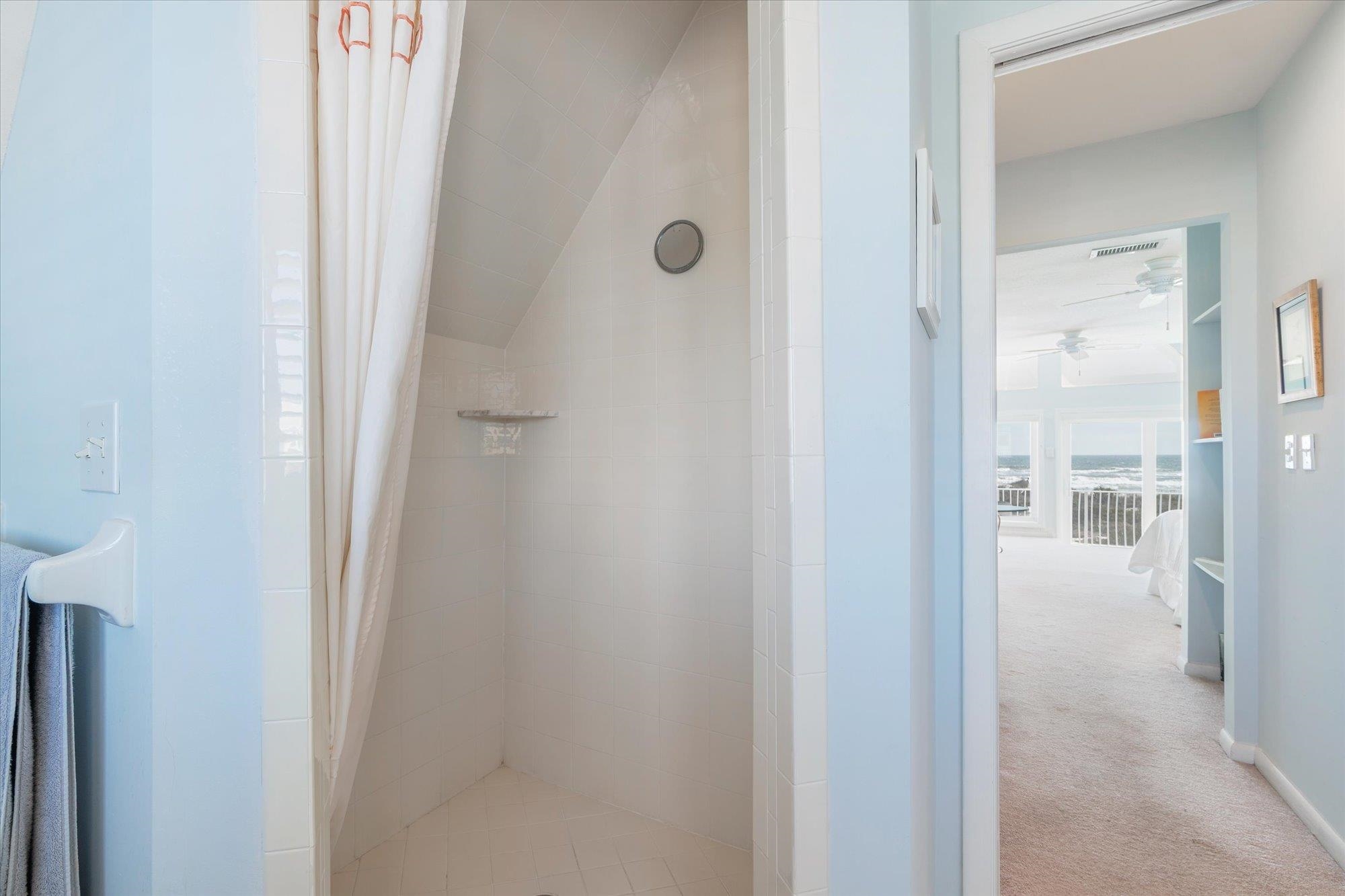 5512 Atlantic View St. Augustine, FL 32080 - Photo 25 of 77 Full bathroom featuring a shower stall and light carpet