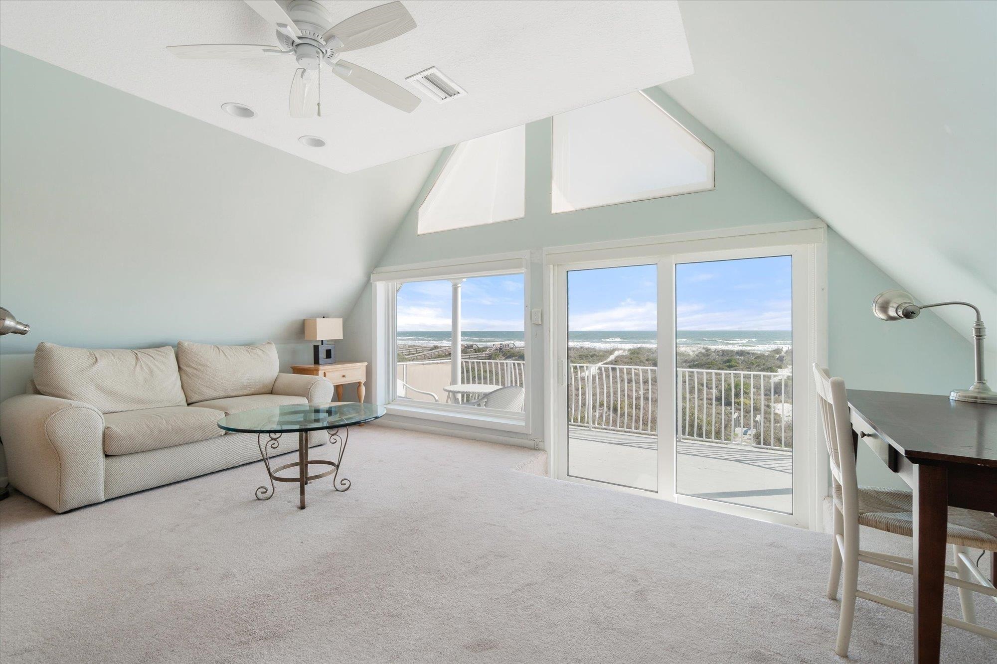 5512 Atlantic View St. Augustine, FL 32080 - Photo 27 of 77 Living room featuring carpet flooring, vaulted ceiling, and a ceiling fan