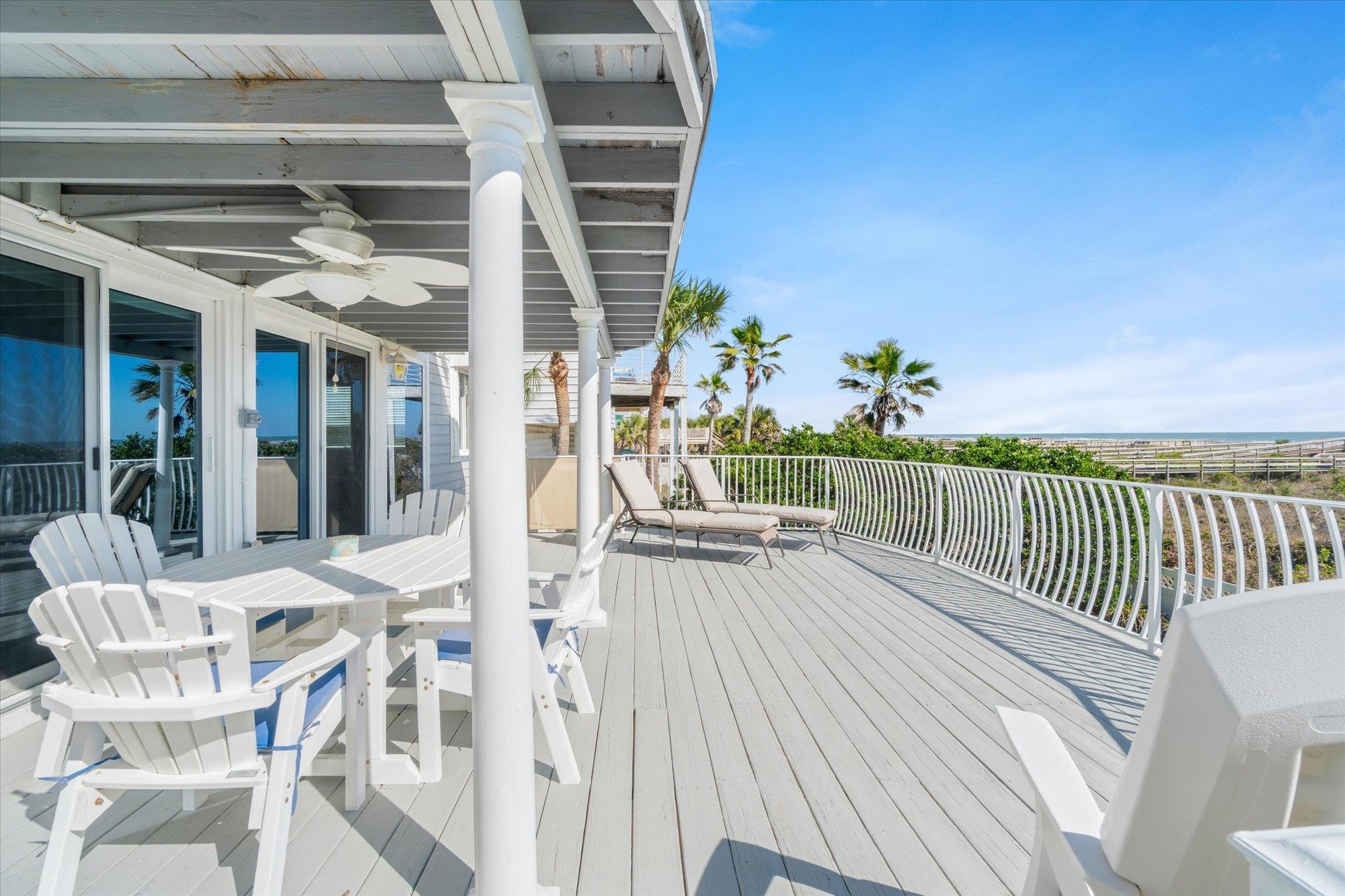 5512 Atlantic View St. Augustine, FL 32080 - Photo 29 of 77 Deck with ceiling fan and outdoor dining space