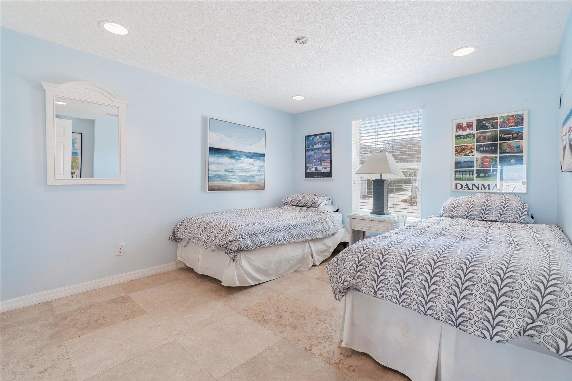 5512 Atlantic View St. Augustine, FL 32080 - Photo 42 of 77 Bedroom with baseboards and a textured ceiling