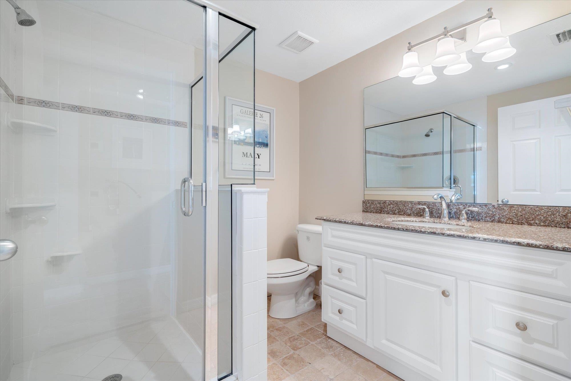 5512 Atlantic View St. Augustine, FL 32080 - Photo 43 of 77 Bathroom with vanity and a shower stall