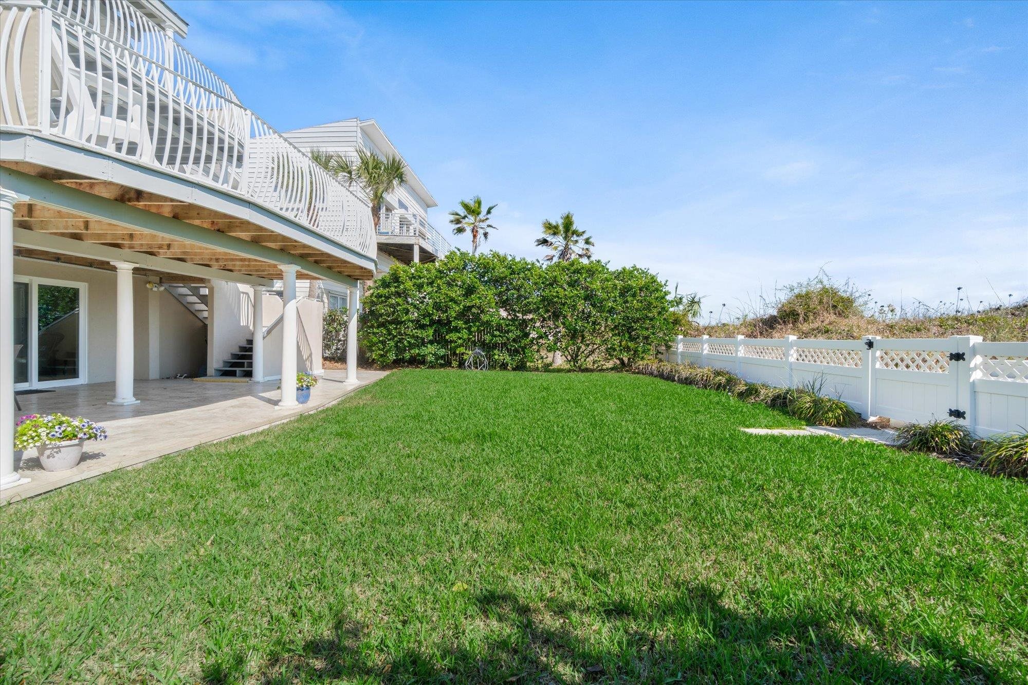 5512 Atlantic View St. Augustine, FL 32080 - Photo 46 of 77 Fenced backyard featuring a patio and a wooden deck