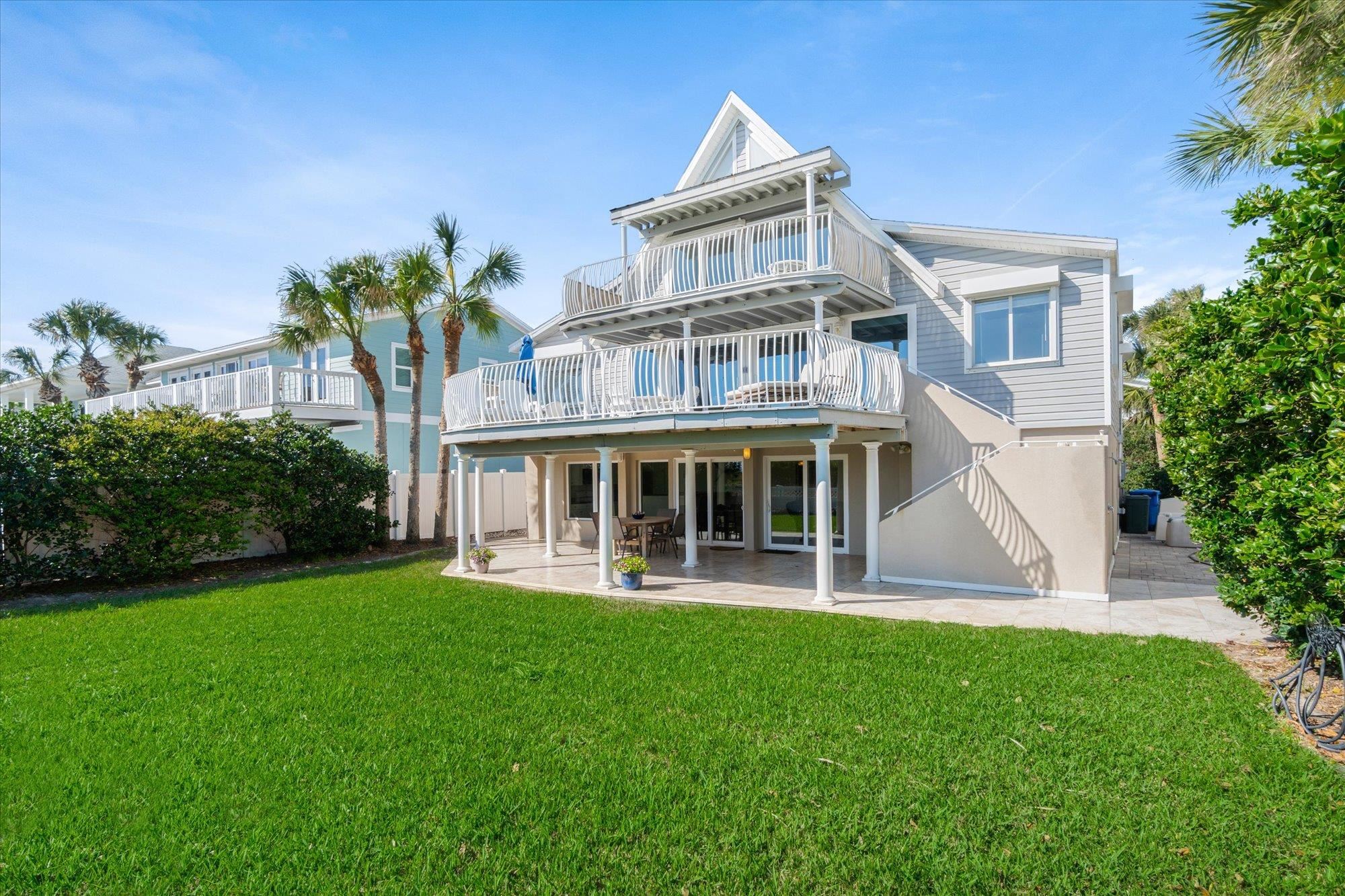 5512 Atlantic View St. Augustine, FL 32080 - Photo 48 of 77 Rear view of house with a patio area and a balcony
