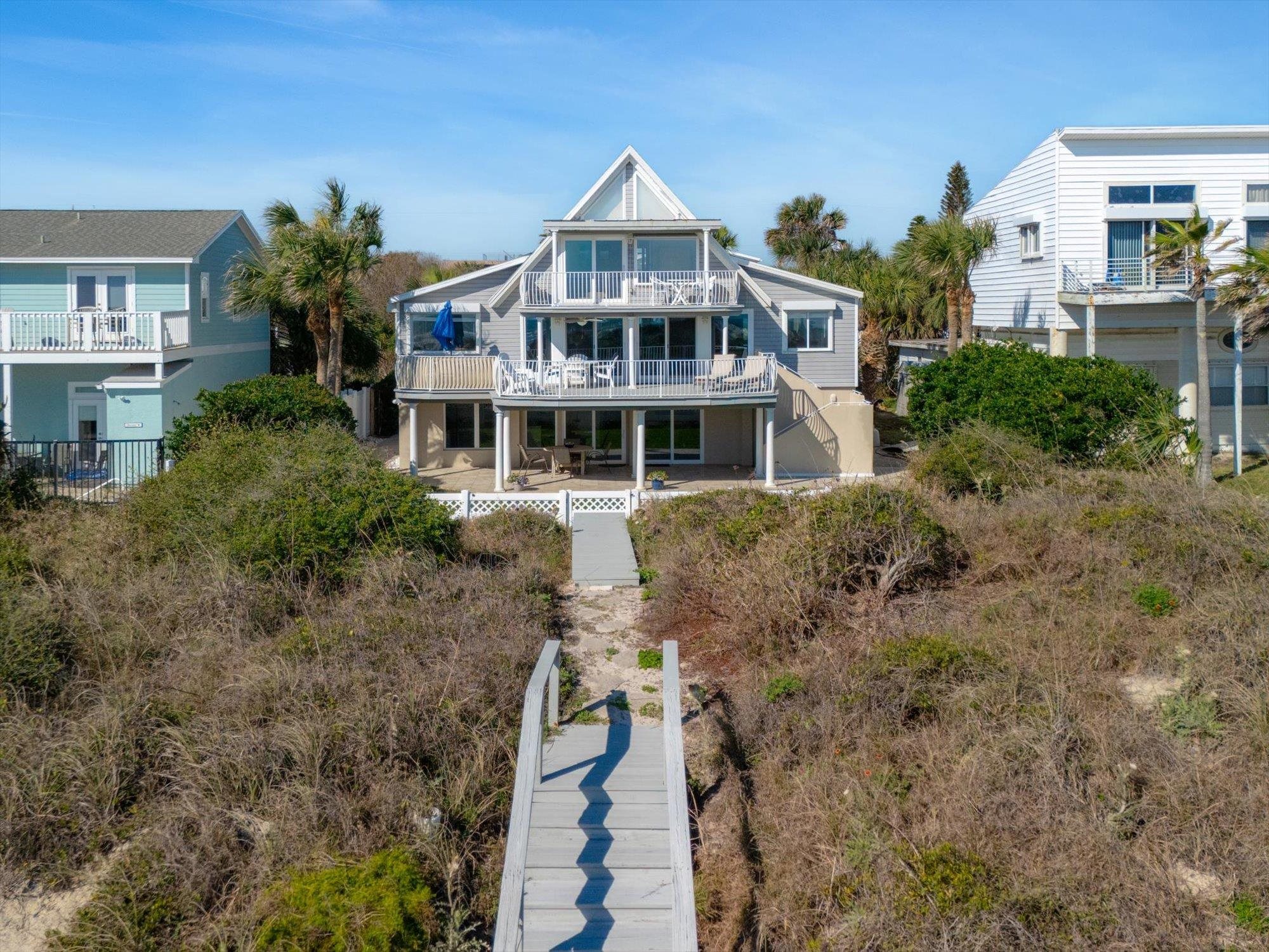 5512 Atlantic View St. Augustine, FL 32080 - Photo 53 of 77 Rear view of house with a patio and stairs