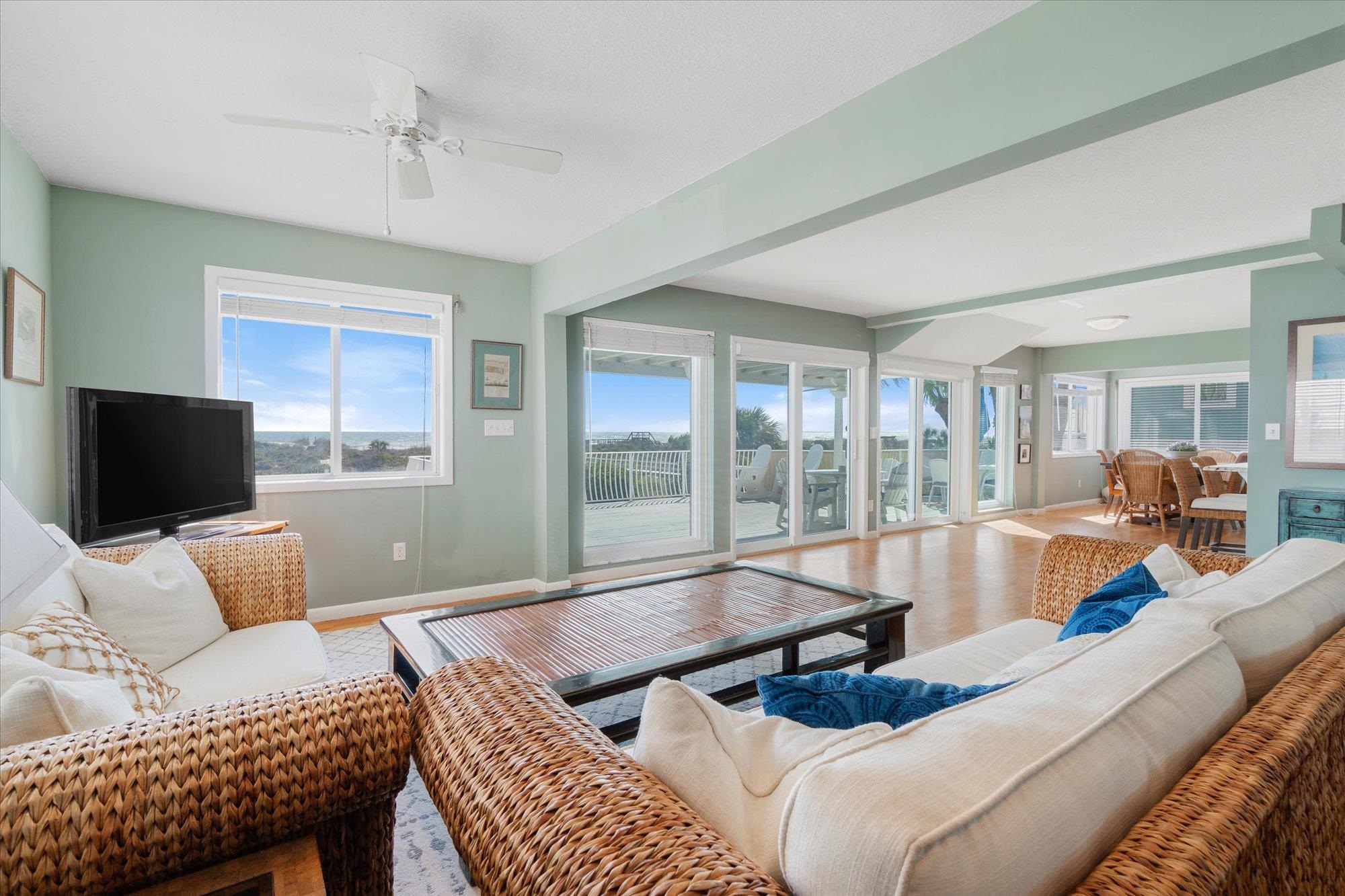 5512 Atlantic View St. Augustine, FL 32080 - Photo 8 of 77 Living area featuring ceiling fan, wood finished floors, and beam ceiling