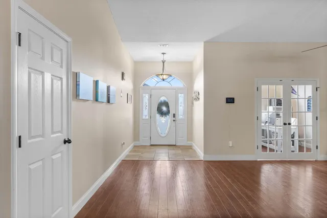 a living room with fireplace furniture and a flat screen tv