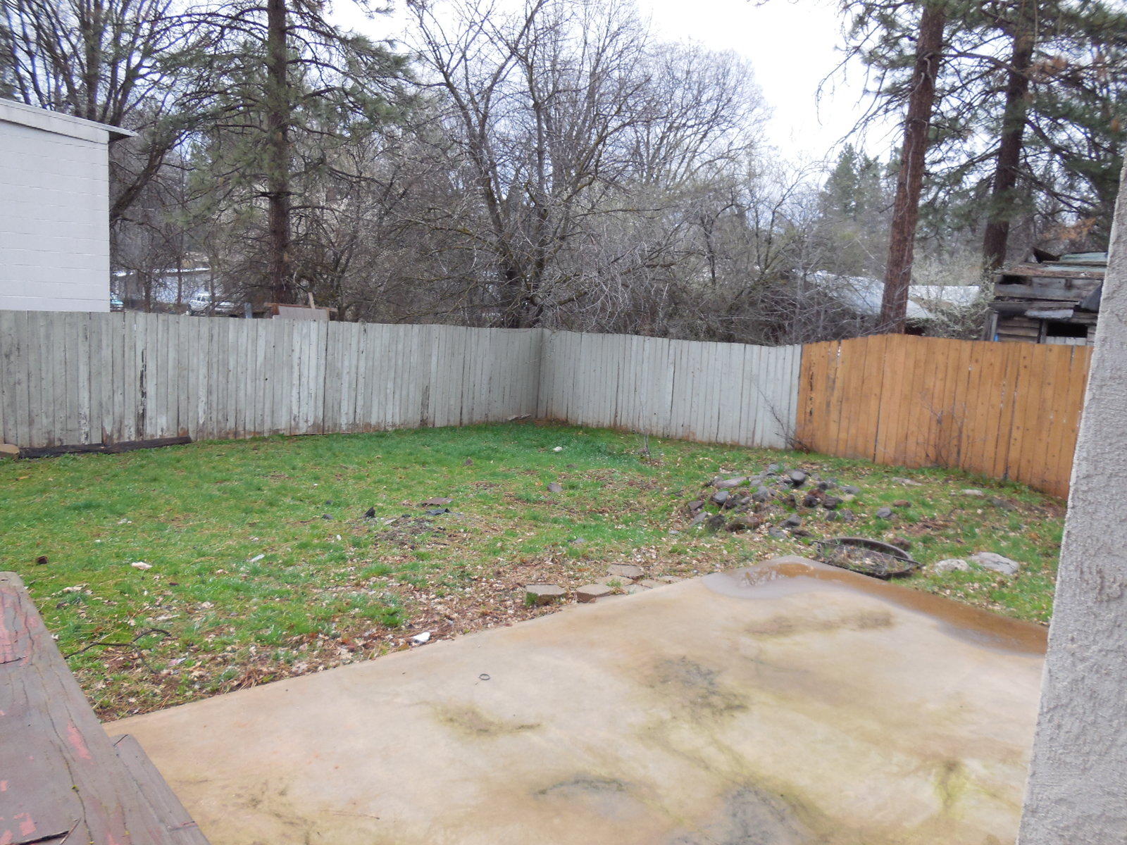21729 2nd Street Burney, CA 96013 - Photo 16 of 26 a view of a backyard with wooden fence
