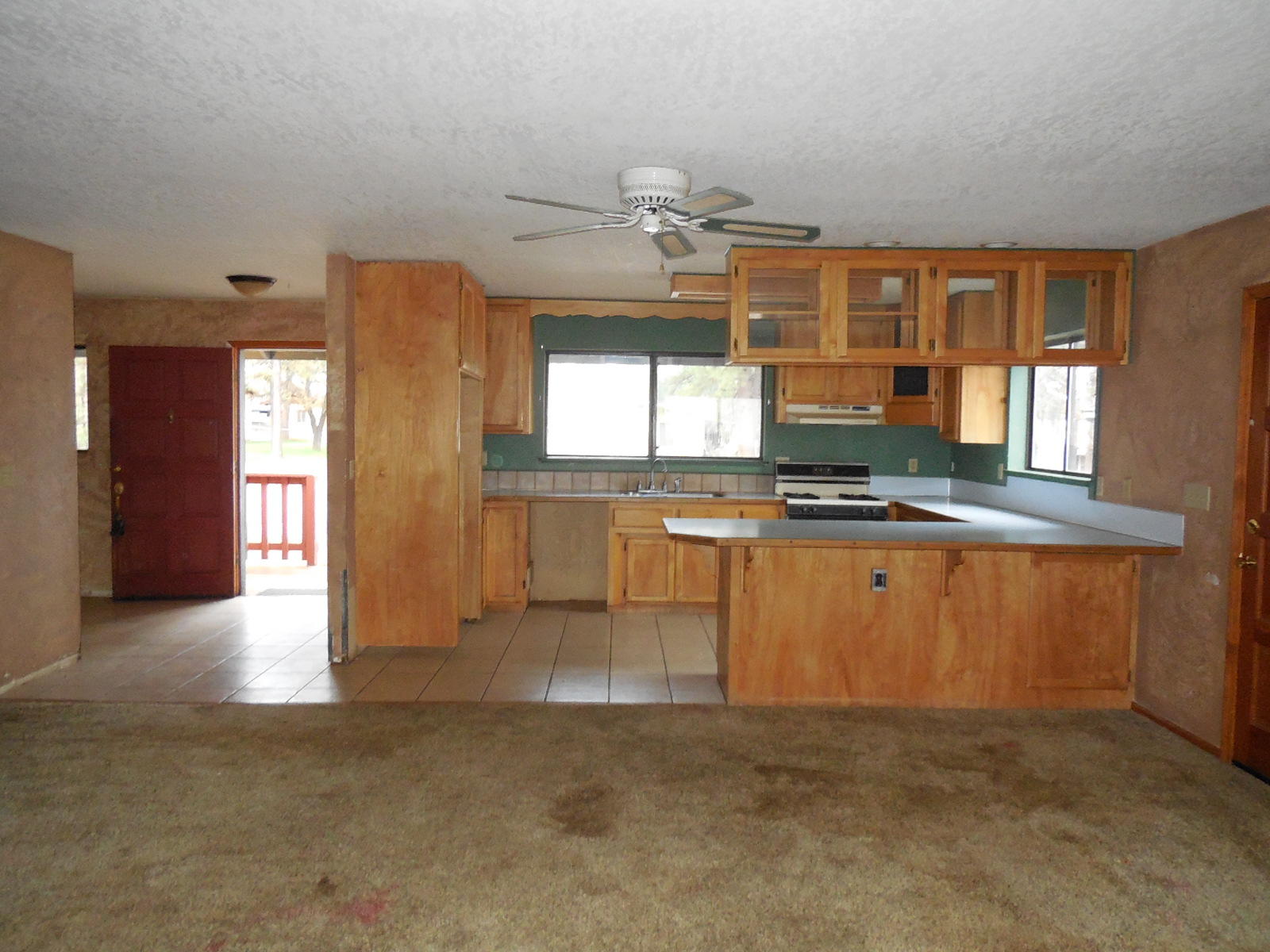 21729 2nd Street Burney, CA 96013 - Photo 4 of 26 a view of kitchen with granite countertop cabinets and window
