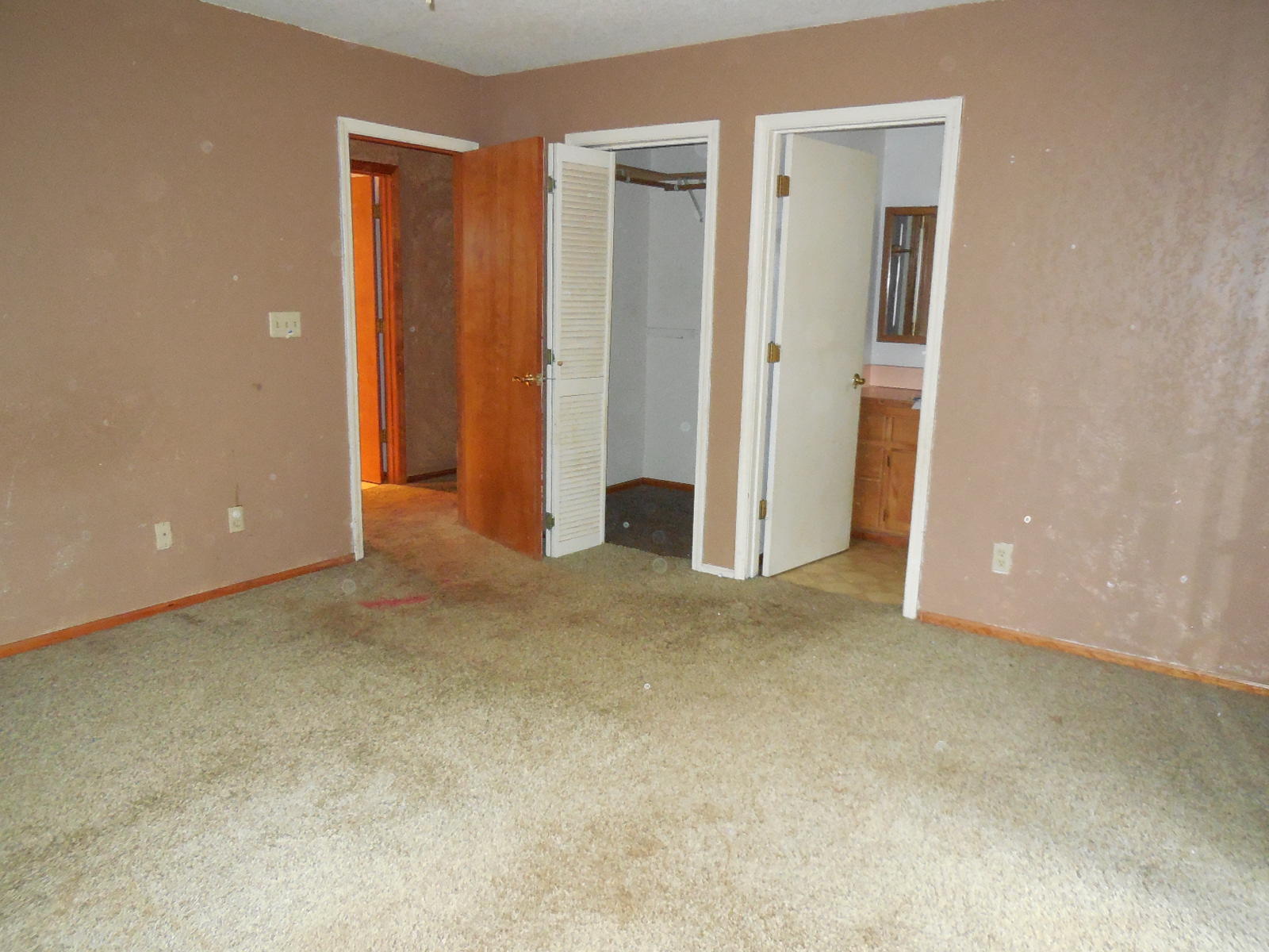 21729 2nd Street Burney, CA 96013 - Photo 5 of 26 an empty room with closet and a bathroom