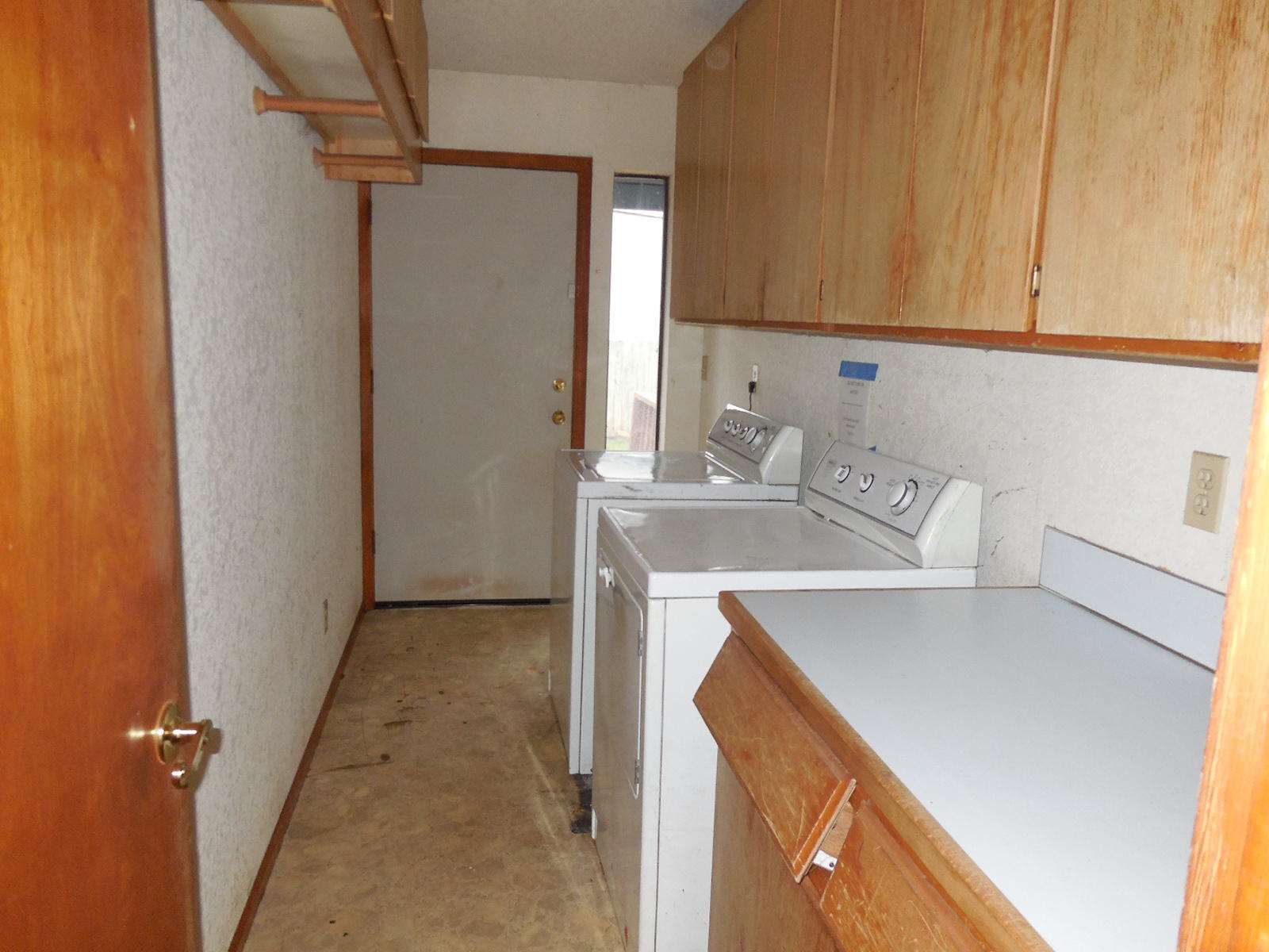 21729 2nd Street Burney, CA 96013 - Photo 8 of 26 a utility room with dryer and washer