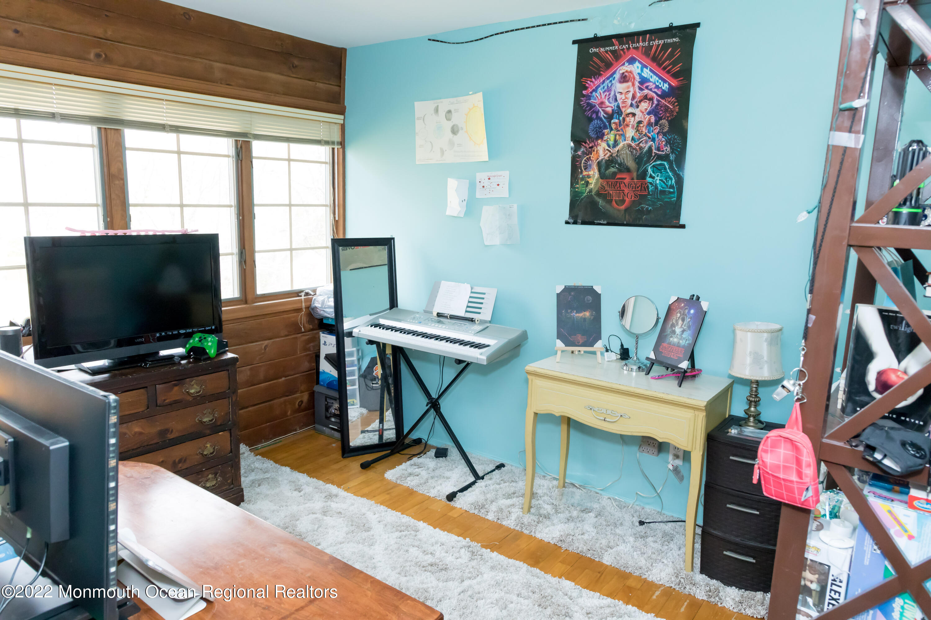 137 Cherry Tree Farm Road Middletown, NJ 07748 - Photo 21 of 36 a work room with furniture a flat screen tv and a window
