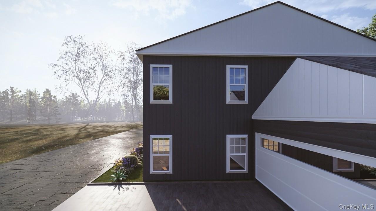 131 Riley Road New Windsor, NY 12553 - Photo 3 of 5 a front view of a house with trees