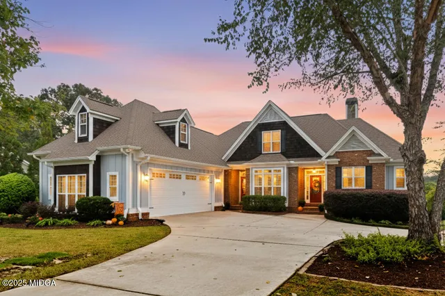 a bathroom with a toilet and shower