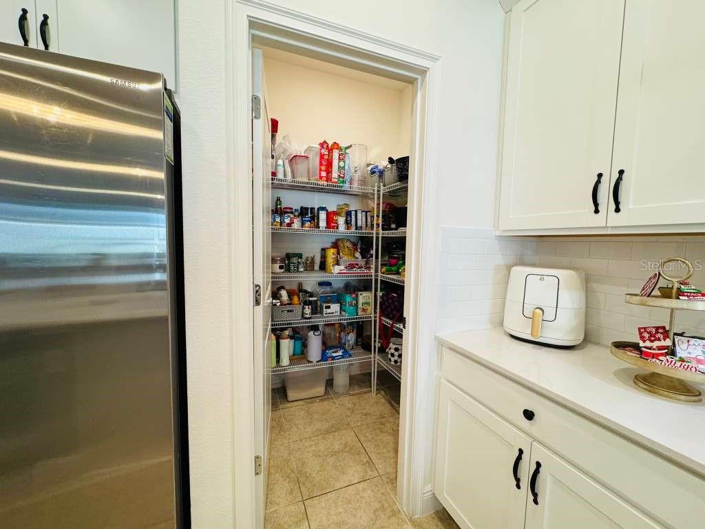 4913 Rain Shadow Drive St. Cloud, FL 34772 - Photo 7 of 22 a view of storage and utility room