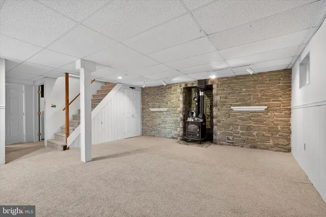 a view of a room with air conditioner and windows