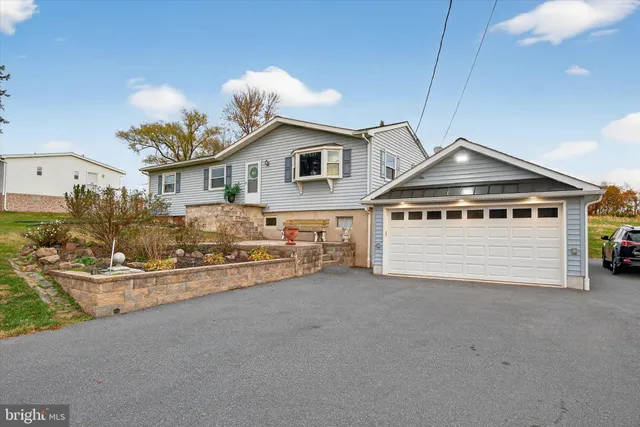 a view of a livingroom with furniture and wooden floor