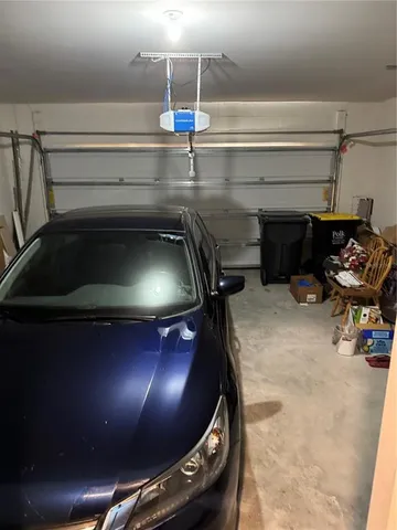 a room with water heater and air hockey table