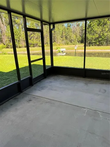 a view of a large window with an outdoor space