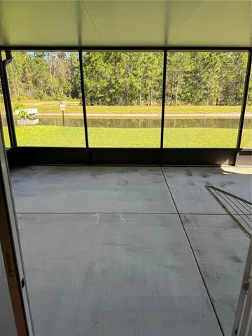 a view of a large window with an outdoor space