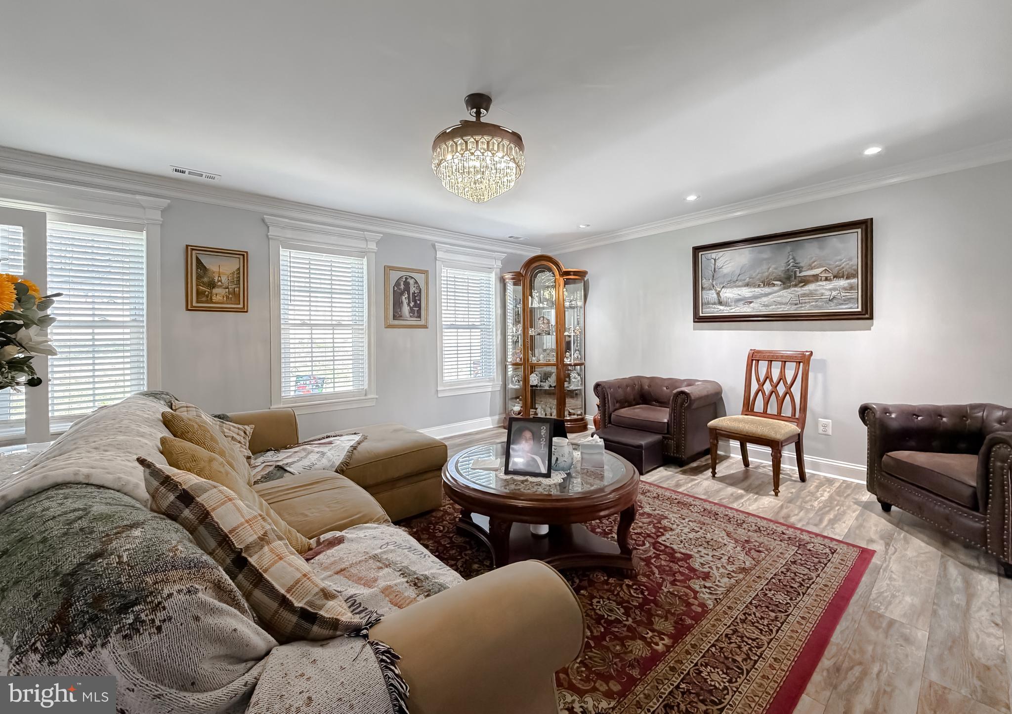 30150 Huntt Road Mechanicsville, MD 20659 - Photo 11 of 40 a living room with furniture a rug and a window