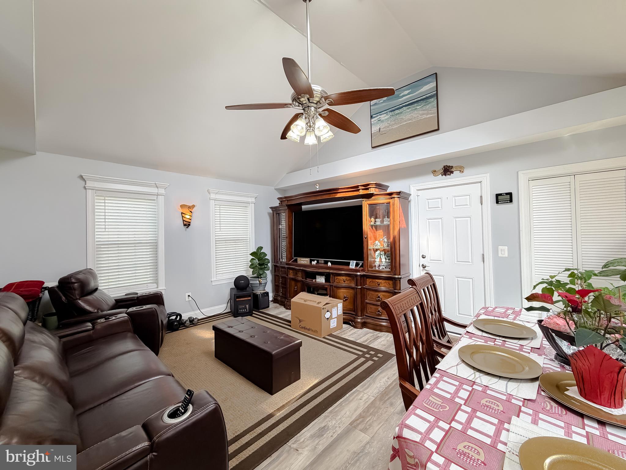30150 Huntt Road Mechanicsville, MD 20659 - Photo 13 of 40 a living room with furniture and a flat screen tv