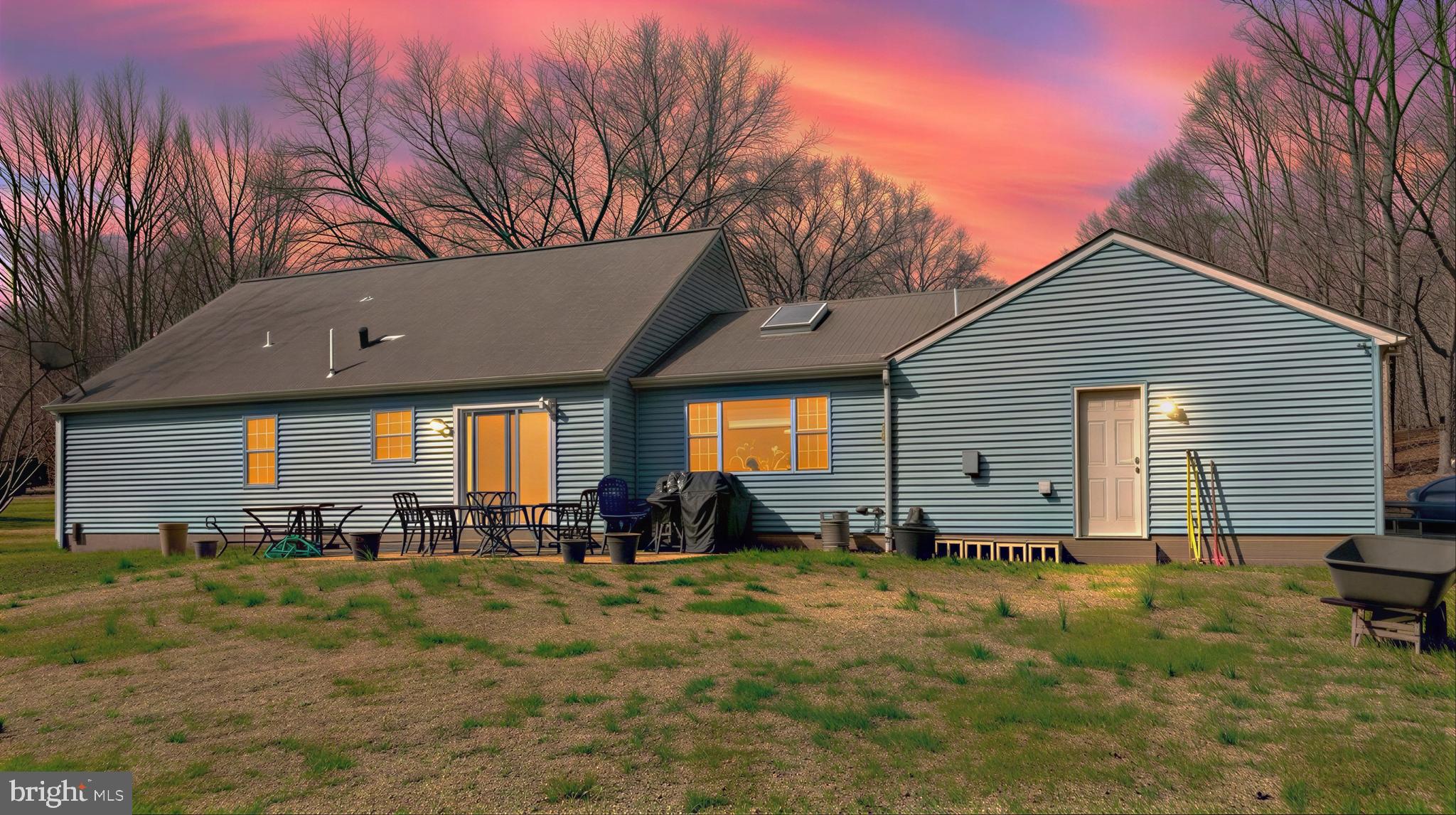 30150 Huntt Road Mechanicsville, MD 20659 - Photo 2 of 40 a front view of house with yard and trees in the background