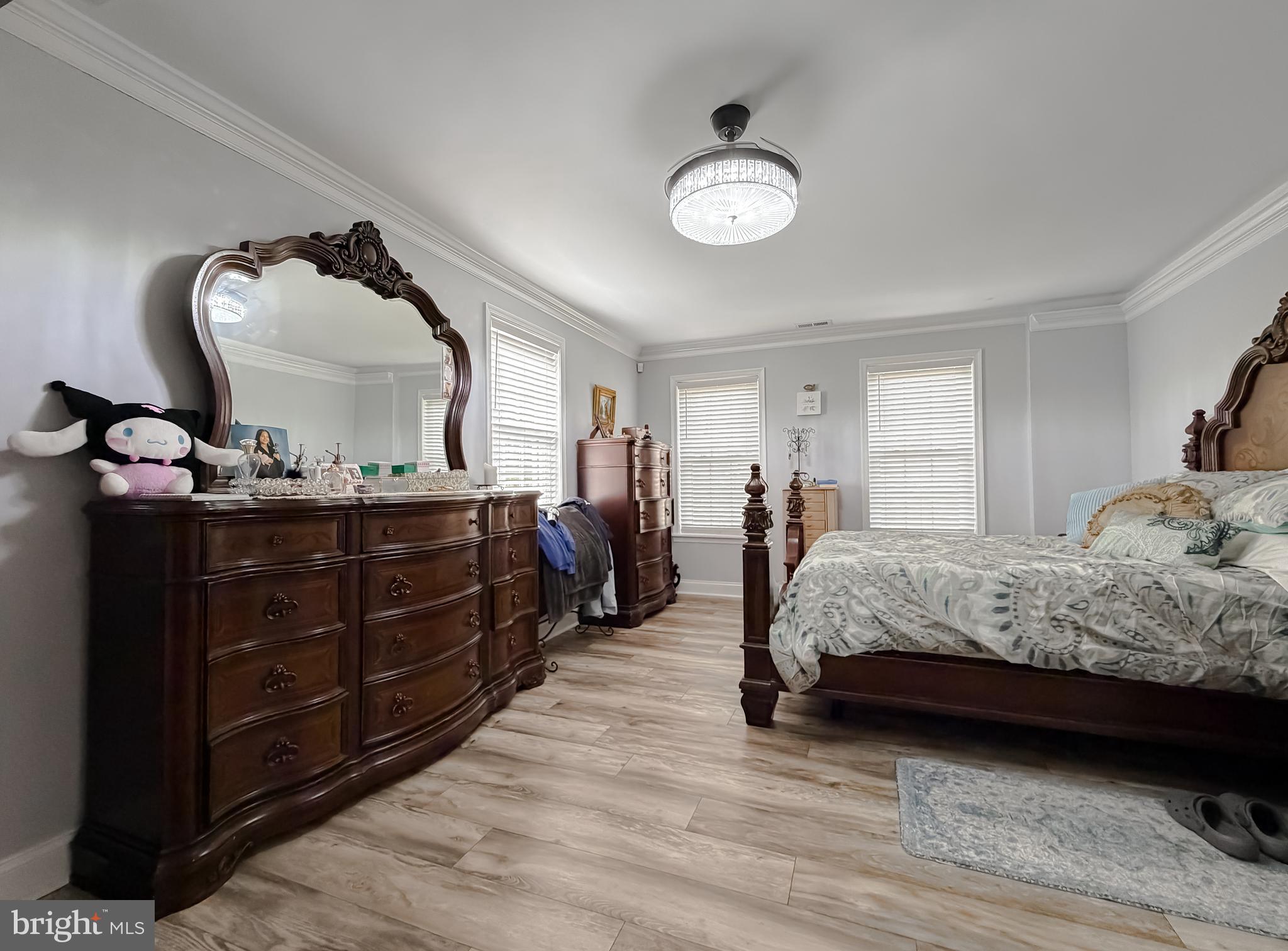 30150 Huntt Road Mechanicsville, MD 20659 - Photo 24 of 40 a bedroom with a bed and a mirror