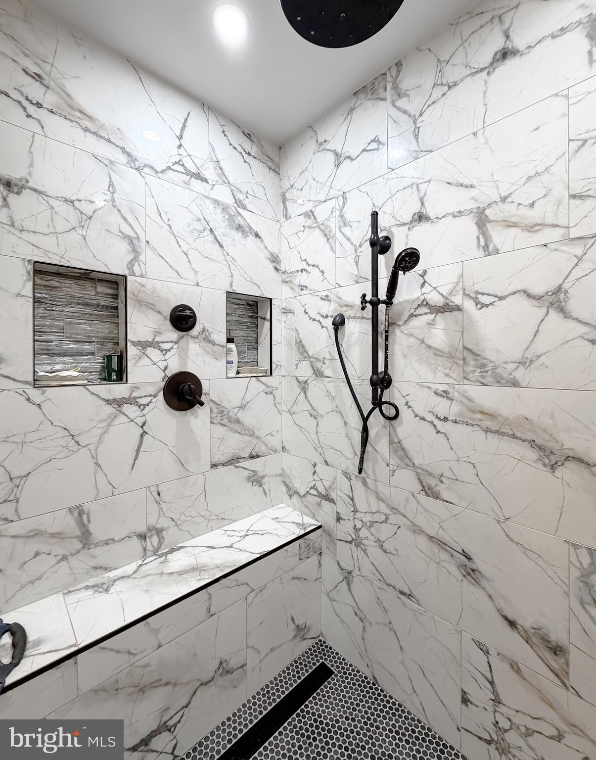 30150 Huntt Road Mechanicsville, MD 20659 - Photo 28 of 40 a view of a bathroom with a sink and glass door