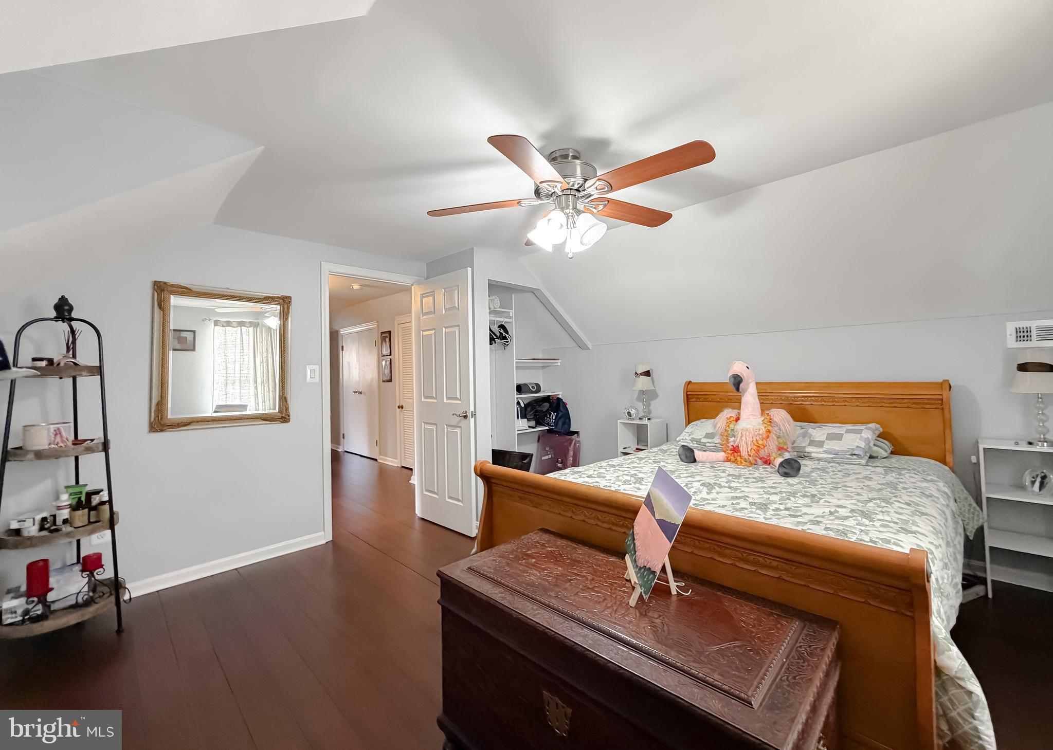 30150 Huntt Road Mechanicsville, MD 20659 - Photo 30 of 40 a bedroom with furniture and a chandelier