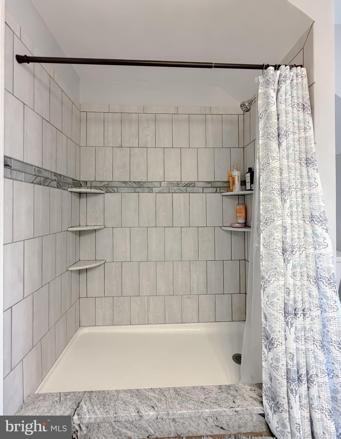 30150 Huntt Road Mechanicsville, MD 20659 - Photo 33 of 40 a bathroom with a bathtub and shower