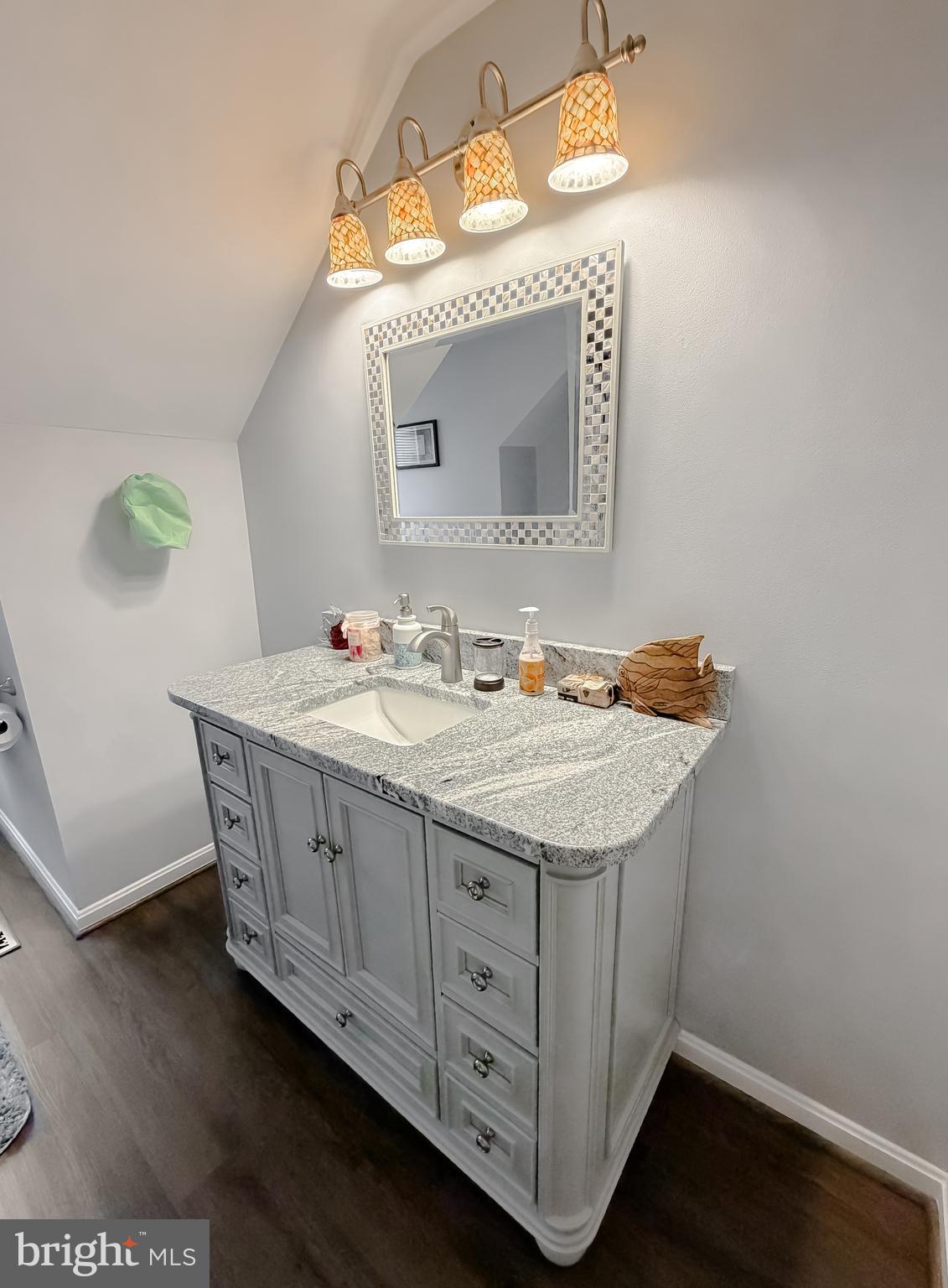 30150 Huntt Road Mechanicsville, MD 20659 - Photo 34 of 40 a bathroom with a granite countertop sink and a mirror