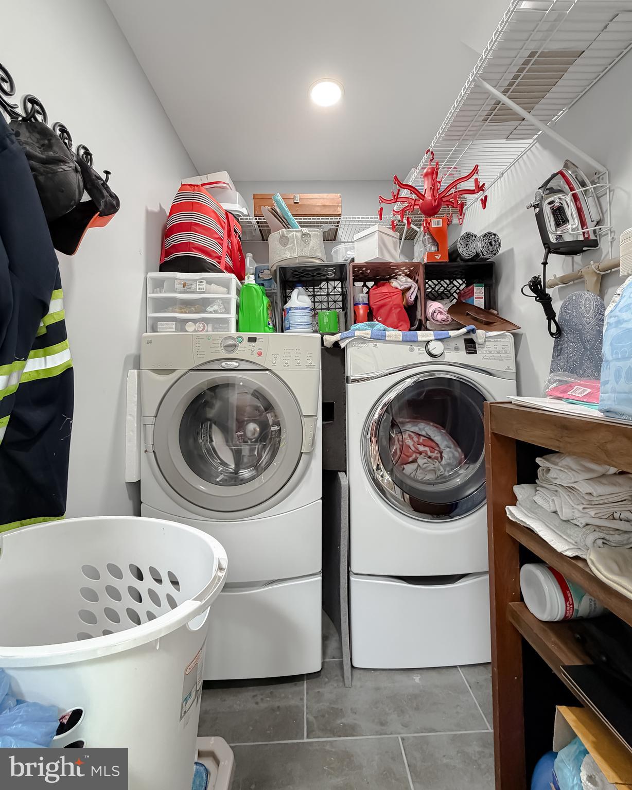 30150 Huntt Road Mechanicsville, MD 20659 - Photo 38 of 40 a bathroom with a sink a washer and dryer