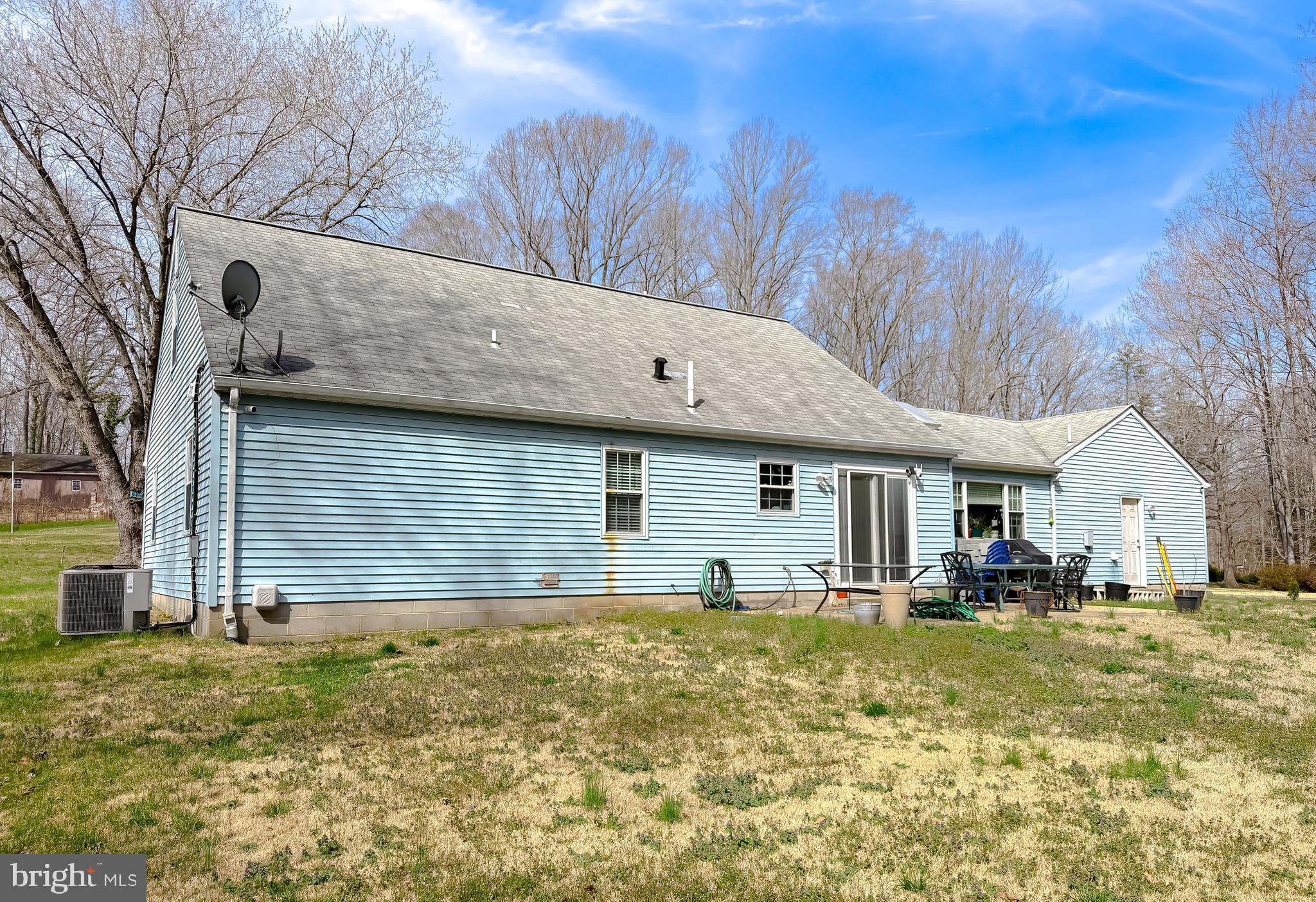 30150 Huntt Road Mechanicsville, MD 20659 - Photo 40 of 40 a front view of house with yard and trees in the background
