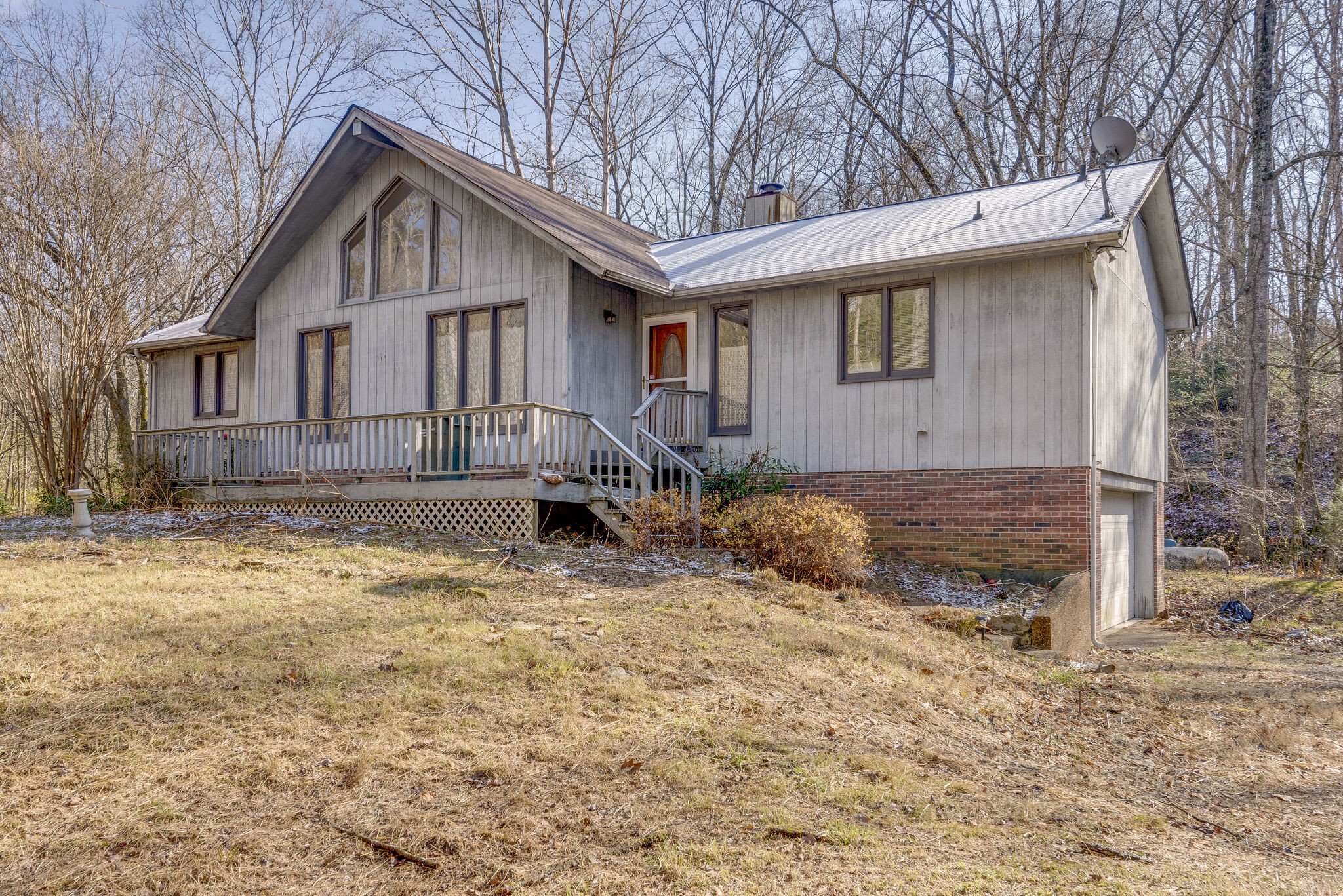 7393 Walker Road Fairview, TN 37062 - Photo 2 of 25 a view of a house with a yard covered in snow