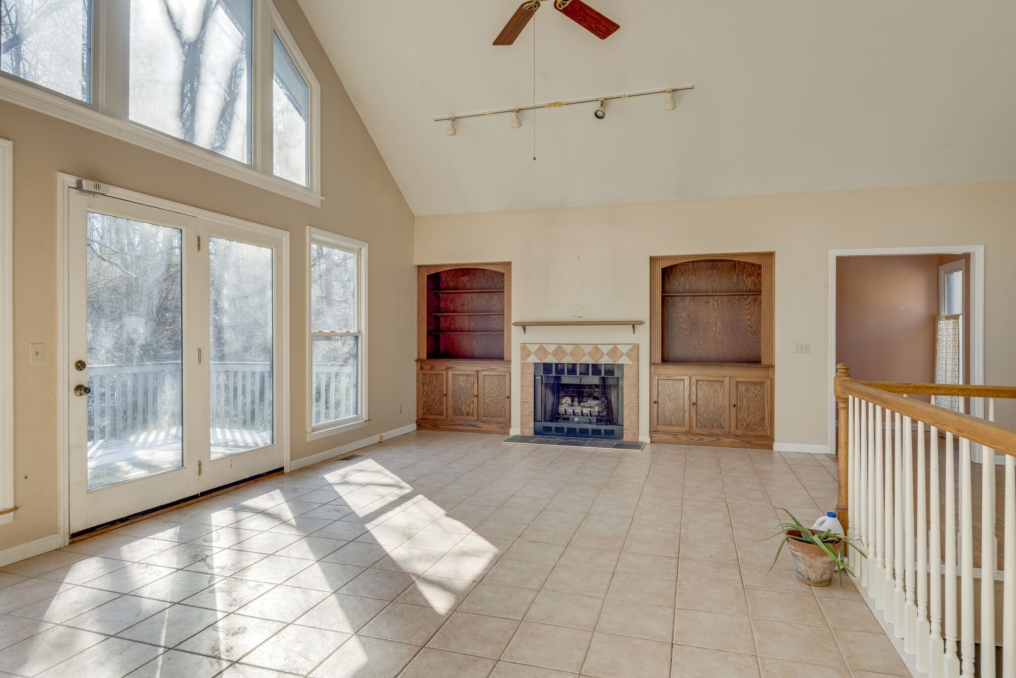7393 Walker Road Fairview, TN 37062 - Photo 11 of 25 a view of a hallway with a livingroom with furniture