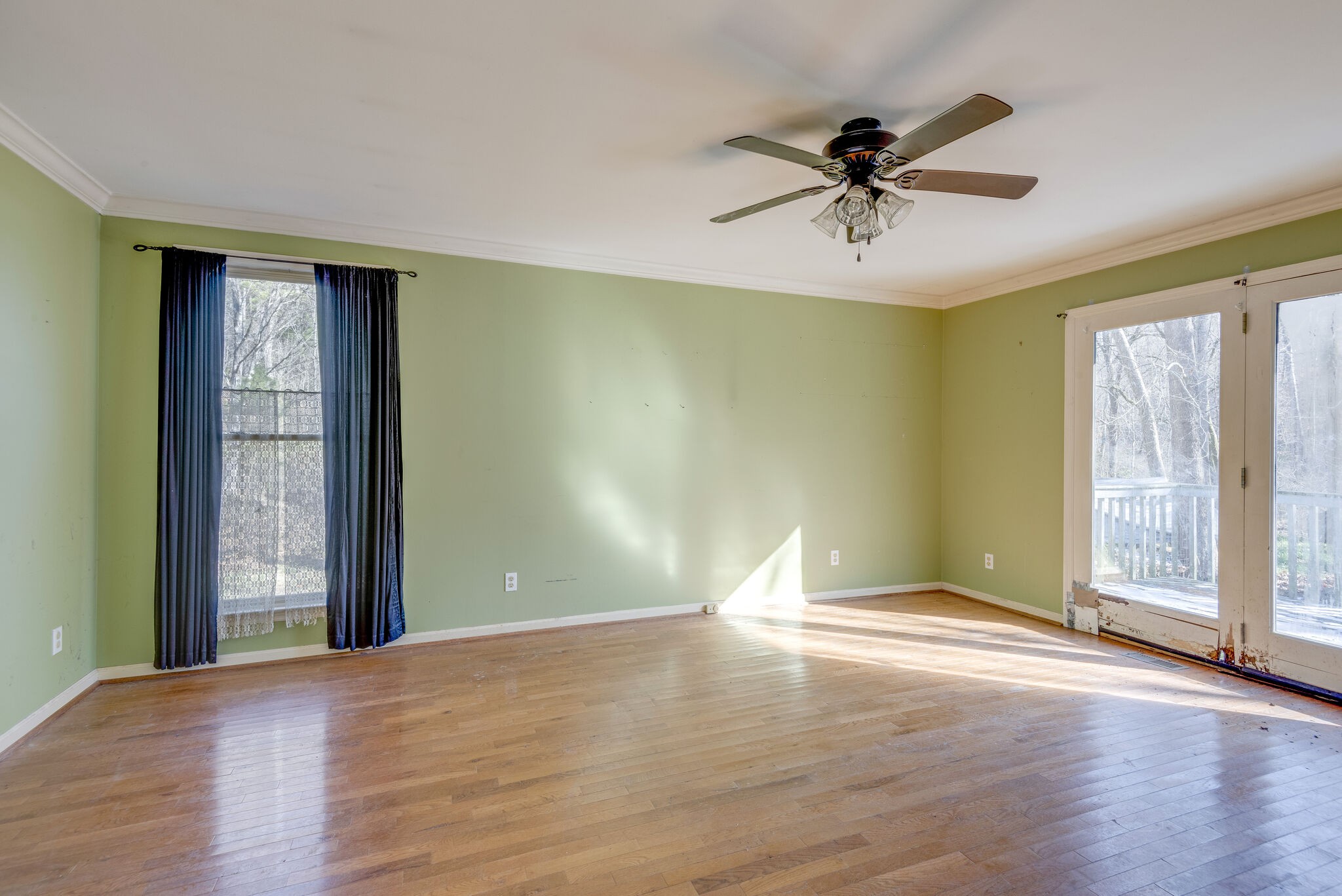 7393 Walker Road Fairview, TN 37062 - Photo 13 of 25 wooden floor in an empty room with a window