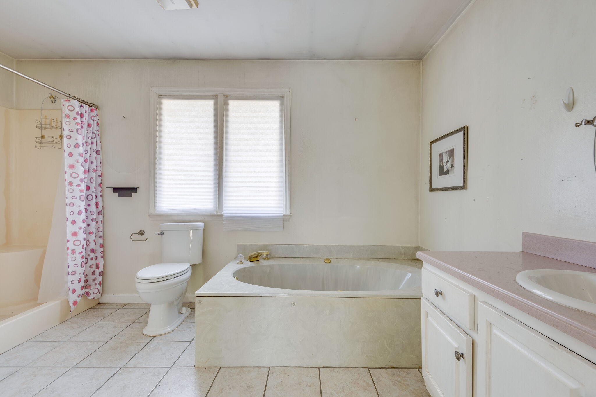 7393 Walker Road Fairview, TN 37062 - Photo 15 of 25 a bath room with a toilet and a bath tub
