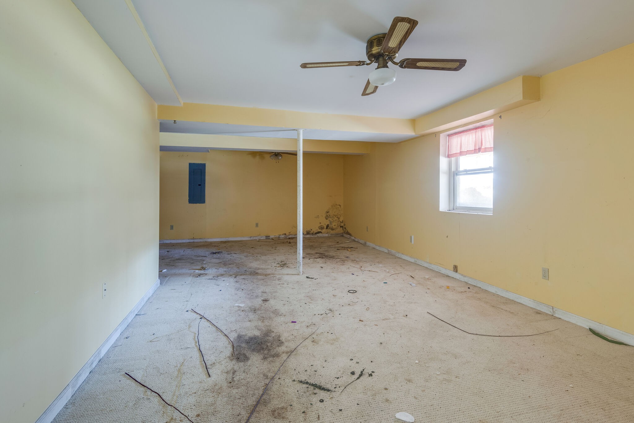 7393 Walker Road Fairview, TN 37062 - Photo 23 of 25 a view of a livingroom with a ceiling fan and window