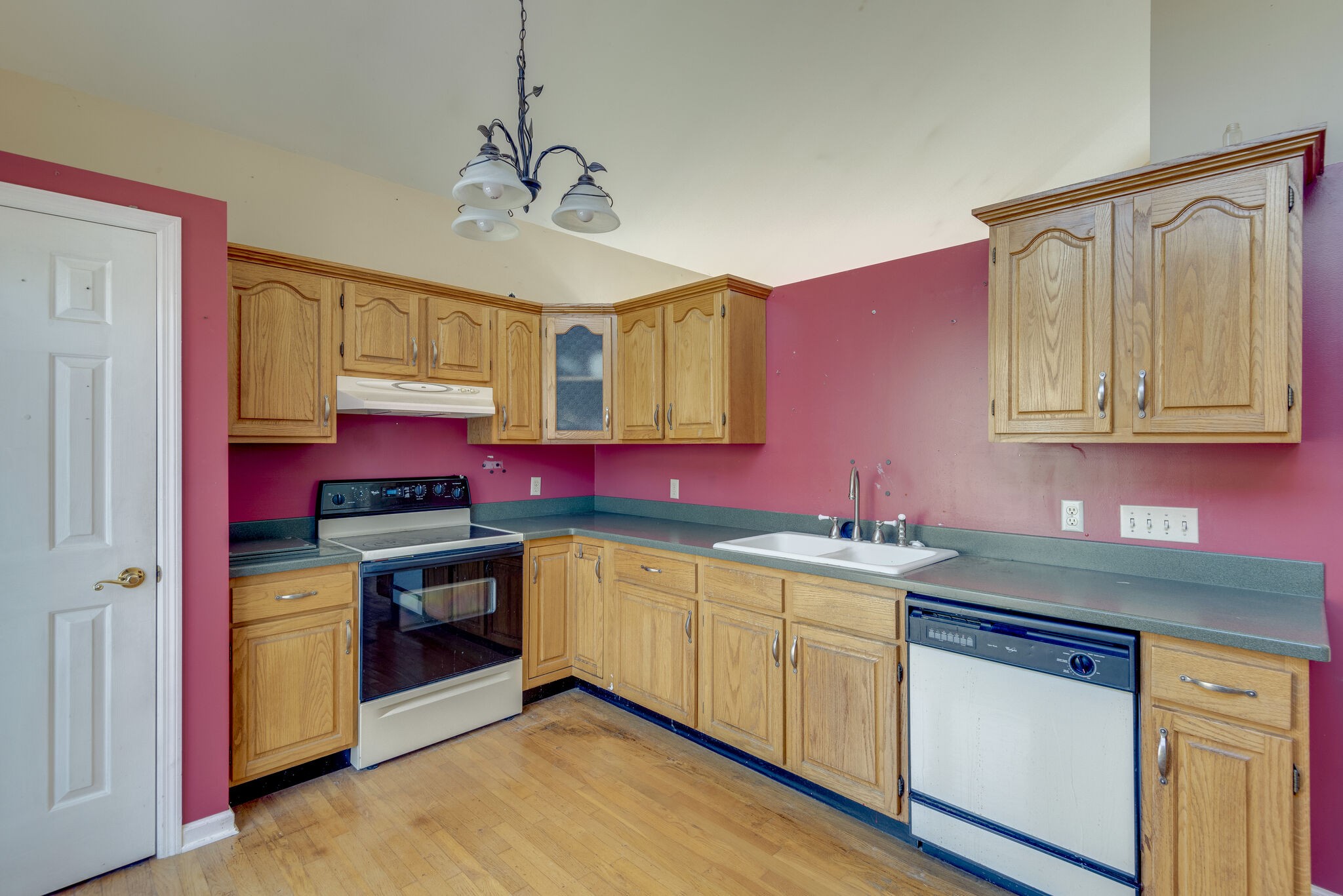 7393 Walker Road Fairview, TN 37062 - Photo 8 of 25 a kitchen with stainless steel appliances granite countertop a sink stove and refrigerator