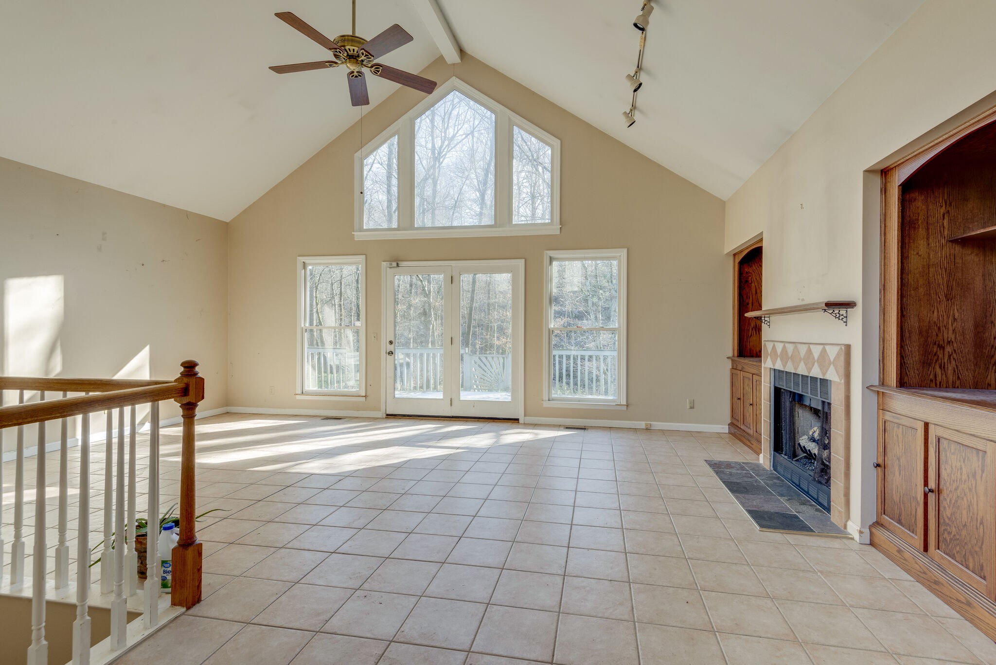 7393 Walker Road Fairview, TN 37062 - Photo 10 of 25 a view of an empty room with window and fire place