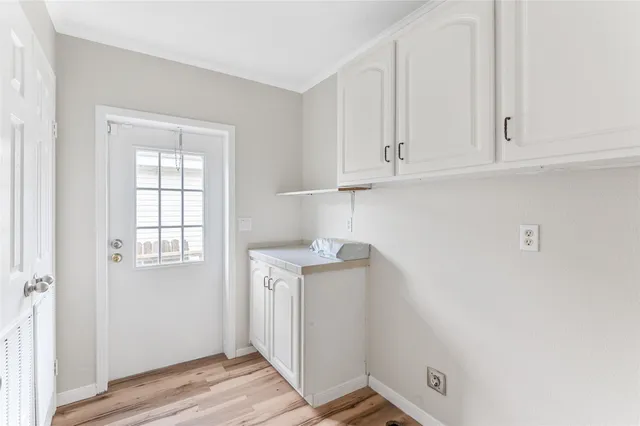 a view of cabinets with wooden floor and cabinets