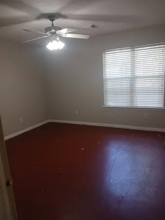 an empty room with a window