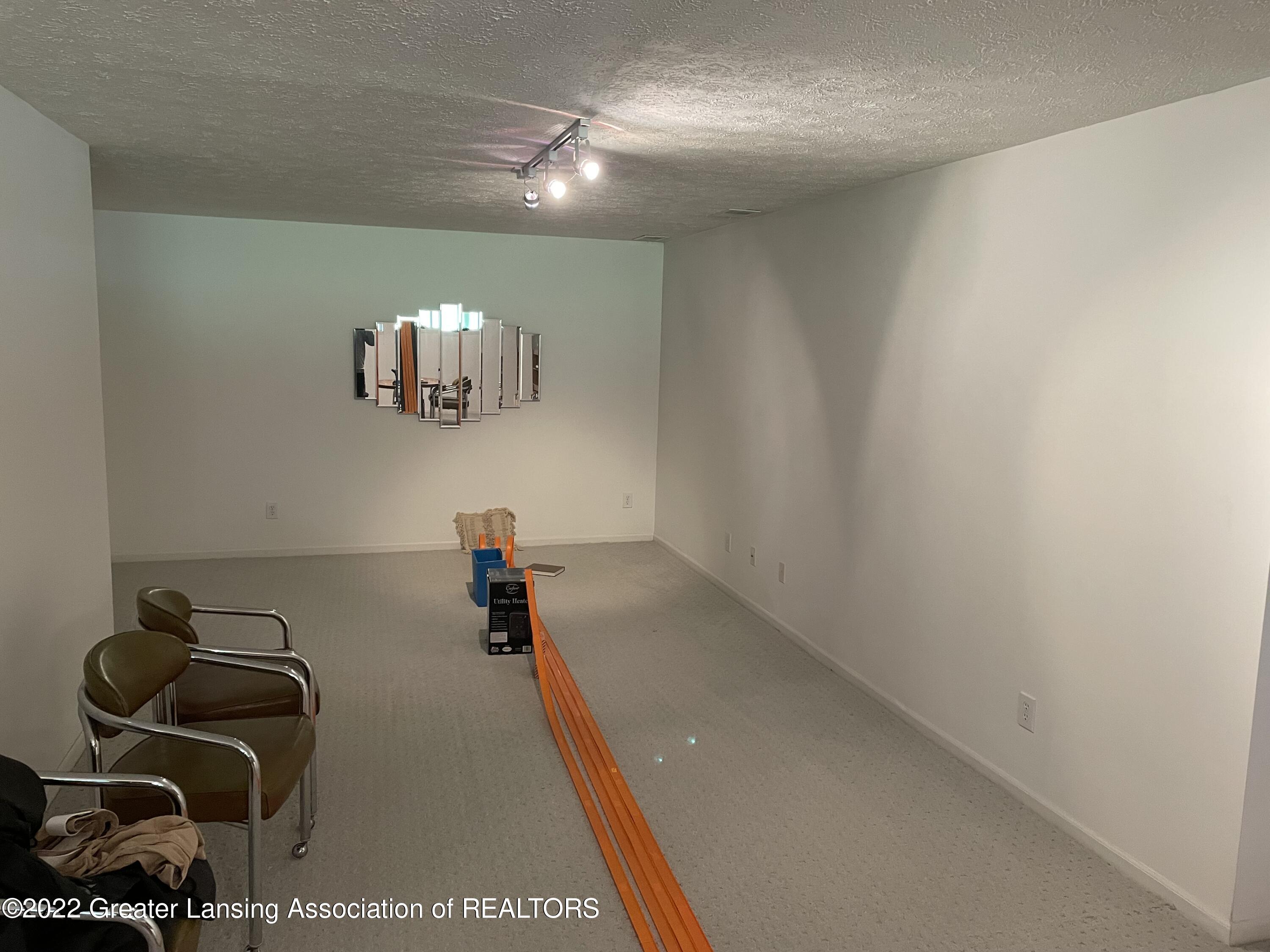2415 North Aurelius Road, Unit 45 Holt, MI 48842 - Photo 35 of 37 Lower level