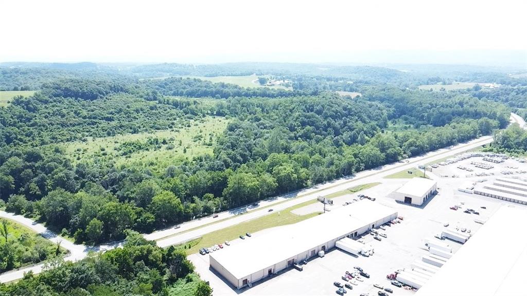 Sr 51 Vances Mill Road Uniontown, PA 15401 - Photo 3 of 3 a view of a field with a mountain in the background