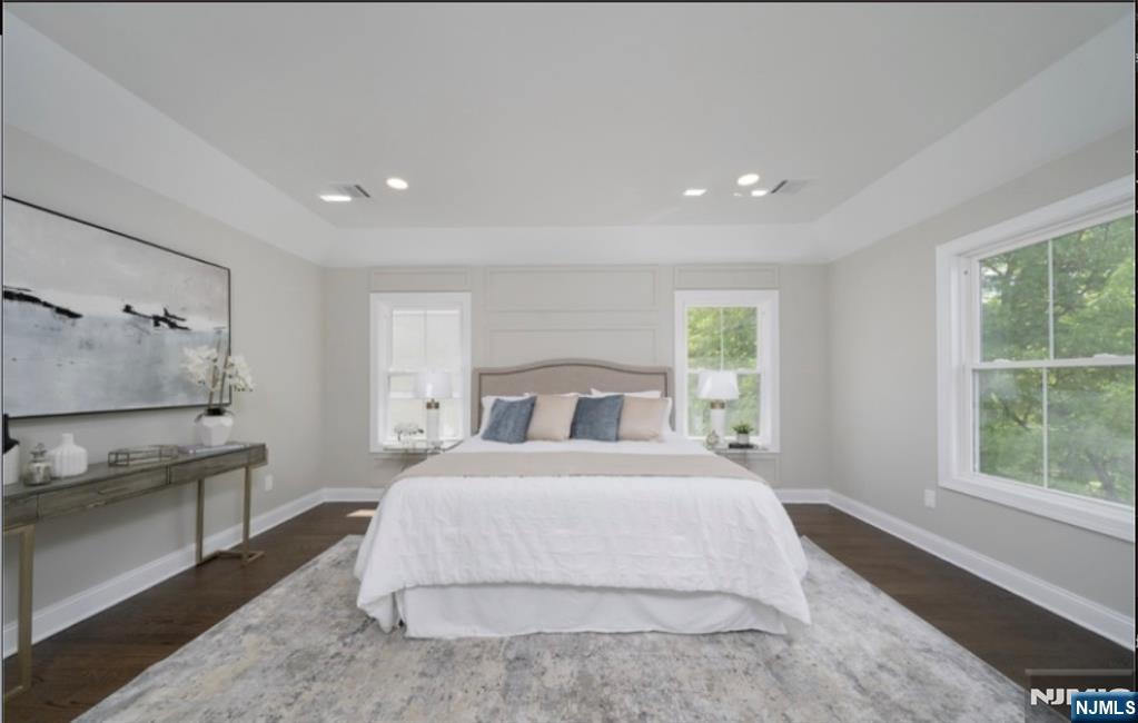 28 Bennington Road Livingston, NJ 07039 - Photo 25 of 38 a bedroom with a large bed and a large window