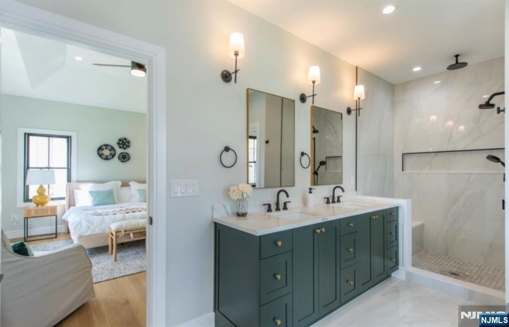 28 Bennington Road Livingston, NJ 07039 - Photo 26 of 38 a spacious bathroom with a double vanity sink mirror and double