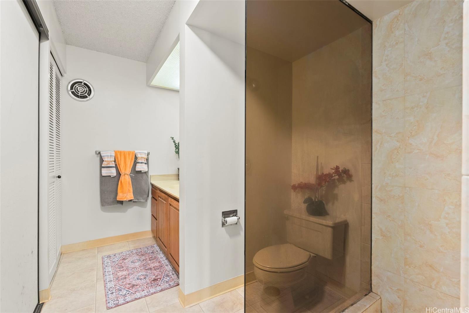 217 Prospect Street, Unit M10 Honolulu, HI 96813 - Photo 13 of 25 a bathroom with a toilet and a shower